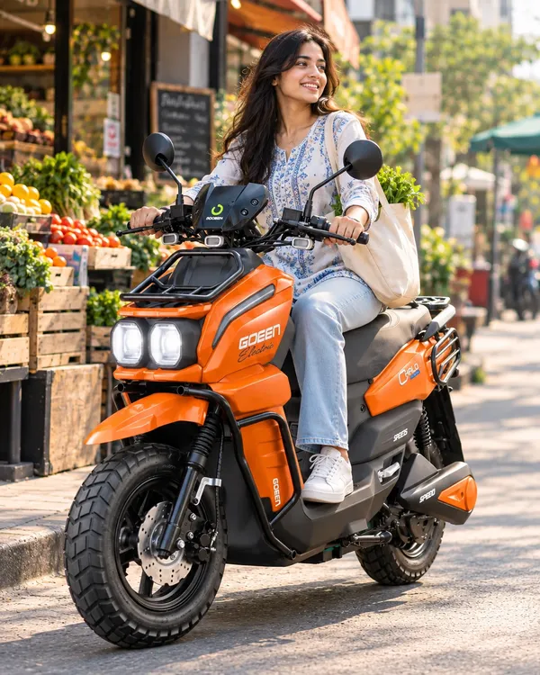 A woman riding an orange CHALO 1000 V2 past a fruit market with her shopping bag