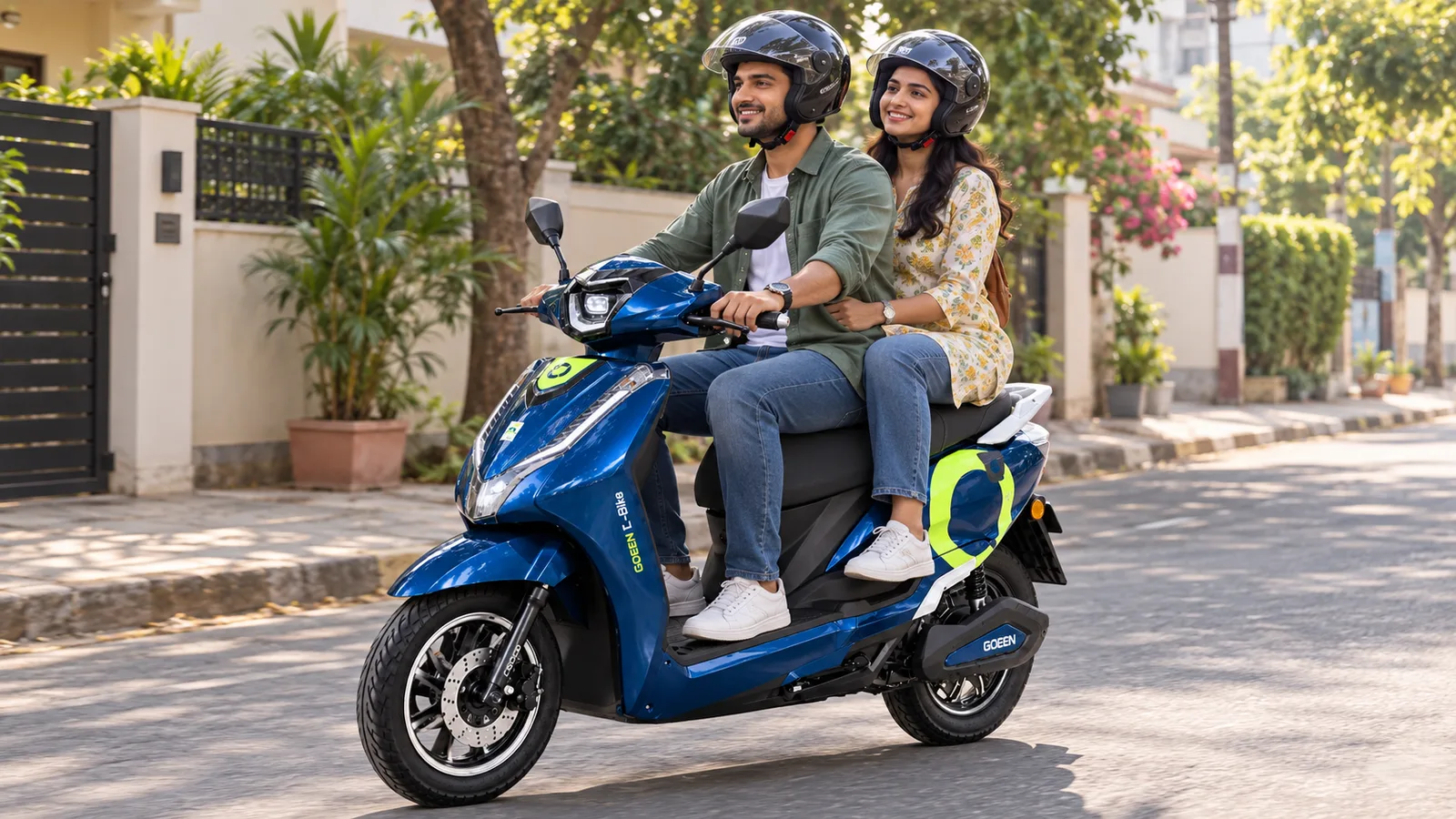 A couple riding two-up on a Deep Blue CHALO SMART PRO down a leafy residential street.