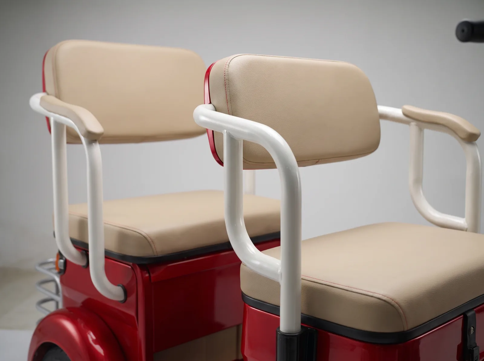 The NJA-7's two tandem passenger seats with padded backrests and white grab rails